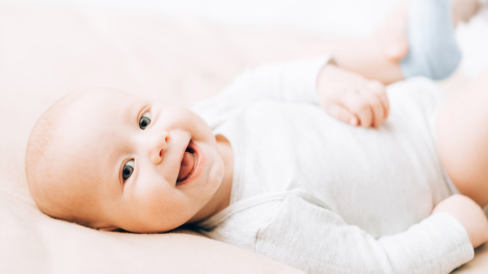 Lächelndes Babie – Kinderwunsch Kö